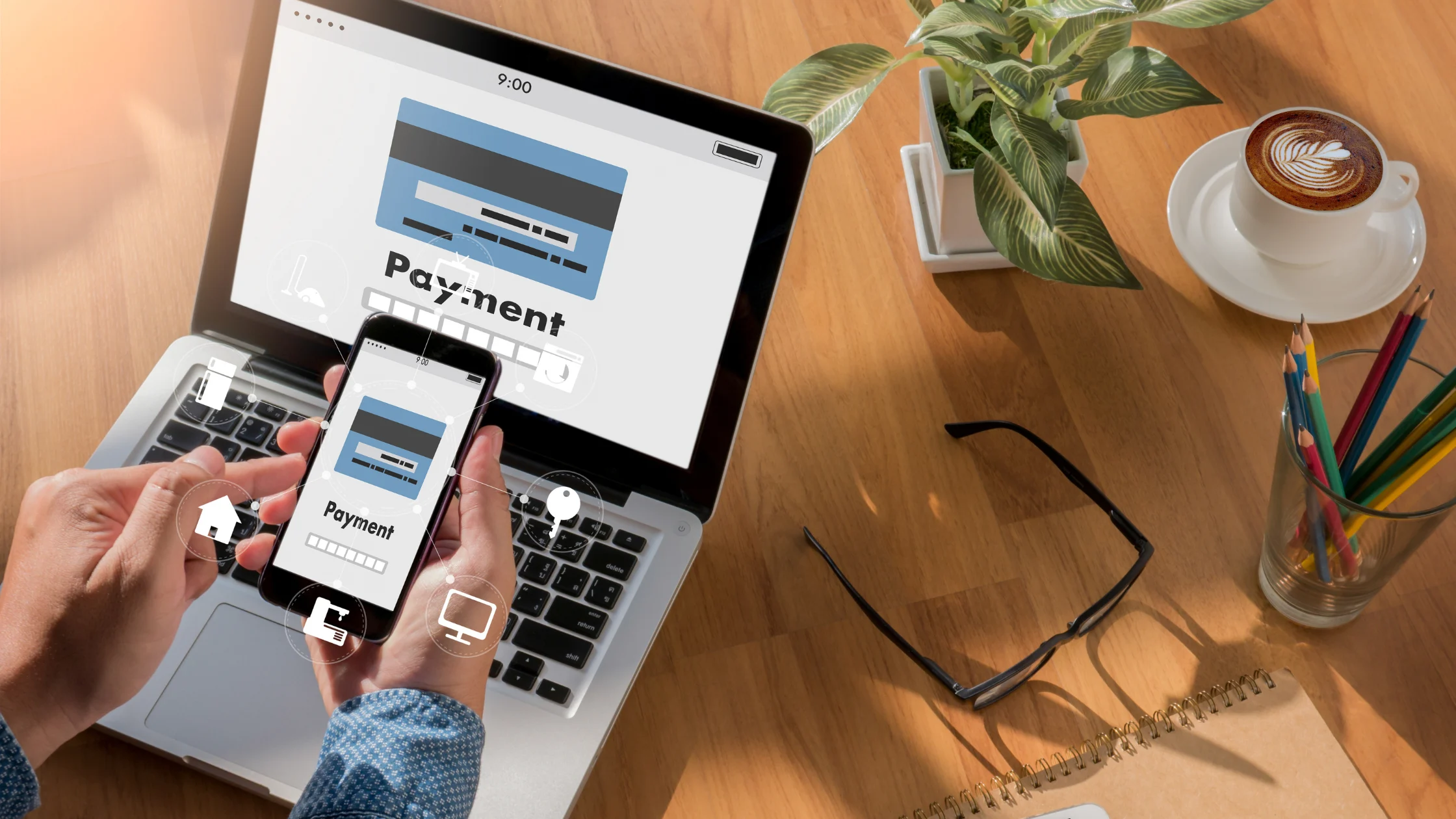 A hand holding a phone, featuring in-progress payment.